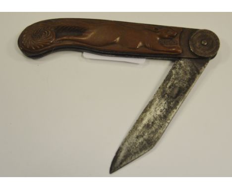 A Russian Hunting knife, handle embossed with a  Squirrel