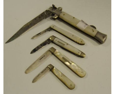 Silver - a silver bladed mother of pearl hafted fruit knife, another similar; a large mother of pearl hafted dagger (5)