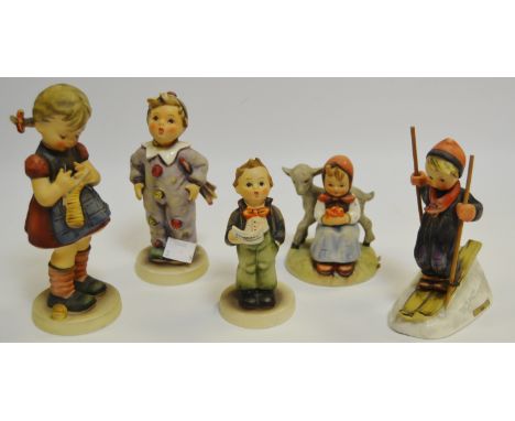An M.J Hummel figure, Skier; others (5)
