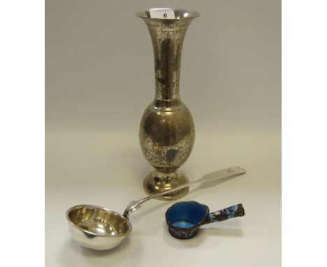 An Indian silver coloured vase; a silver coloured ladle; a Chinese cloisonne and enamel ladle 