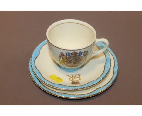 A CLARICE CLIFF CORONATION CUP & SAUCER SET
