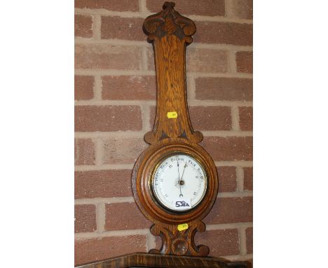 AN OAK BAROMETER, SMALL SHELVING UNIT & A LAMPSHADE