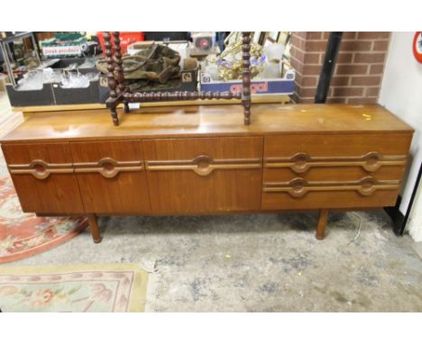AN ERCOL SIDEBOARD WITH INLAID CUTLERY DRAWER