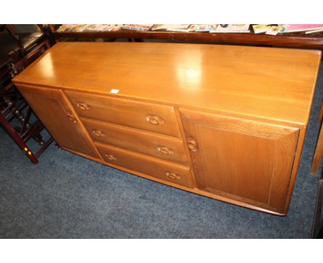AN ERCOL SIDEBOARD WITH FITTED CUTLERY DRAWER