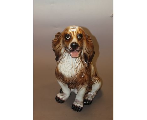 A LARGE CERAMIC FIRESIDE SPANIEL
