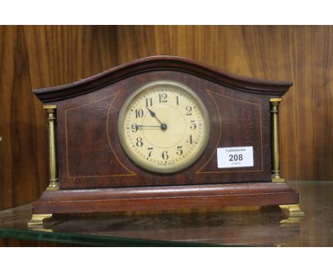 A SWISS MADE INLAID MAHOGANY MANTLE CLOCK