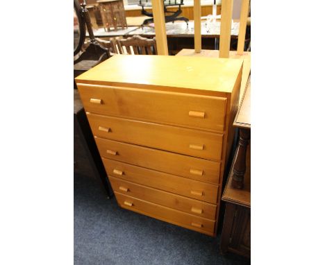 A LIGHTWOOD CHEST OF SIX DRAWERS