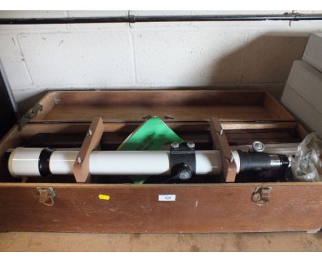 A BOXED ASTRONOMICAL TELESCOPE