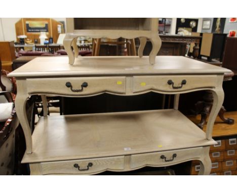 A CONTEMPORARY LIMED COFFEE TABLE WITH TWO FRIEZE DRAWERS