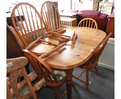 Oval Pine Extending Dining Table and 5x Matching Stick Back Dining Chairs 