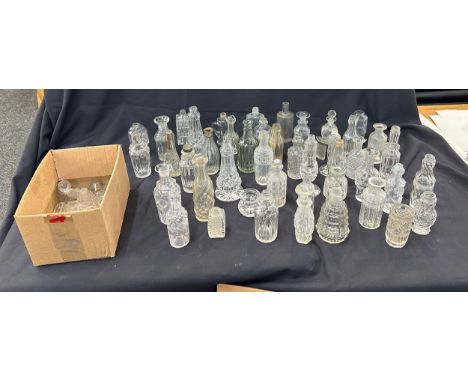 Selection of vintage cut glass bottles some silver rimmed 