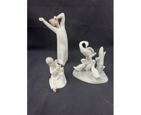 Selection of 3 Nao, 1 Lladro ornaments to include children and ducks , tallest measures approximately 9 inches, all in good o