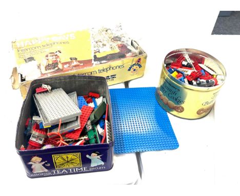 Selection of vintage toys includes Lego, Happy days phone etc
