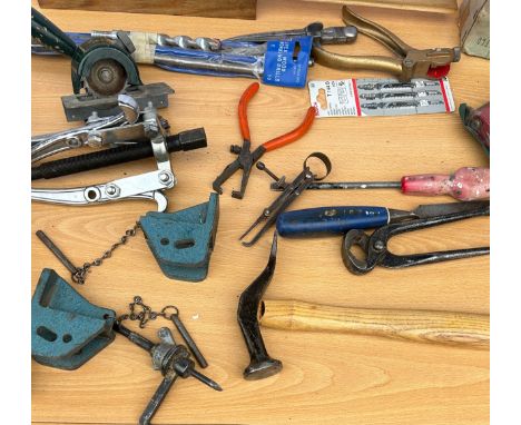 Selection of hand tools including pullers, panel hammer etc
