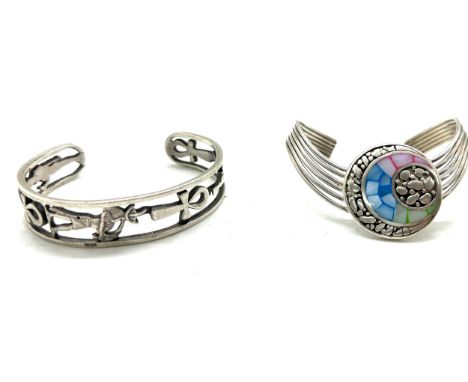 Two silver bangles one with enamel detailing 