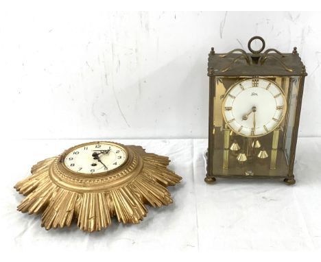 Two vintage clocks one wall hanging one mantel largest measures approx 11 inches tall 