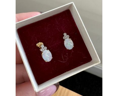 Pair of 14ct gold and opal earrings 