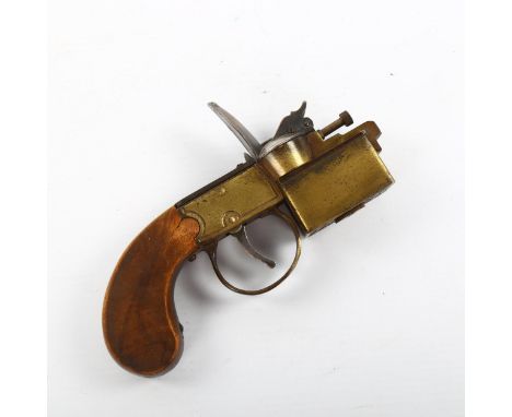A Dunhill tinder pistol lighter, patent no. 592139, length 14cm 