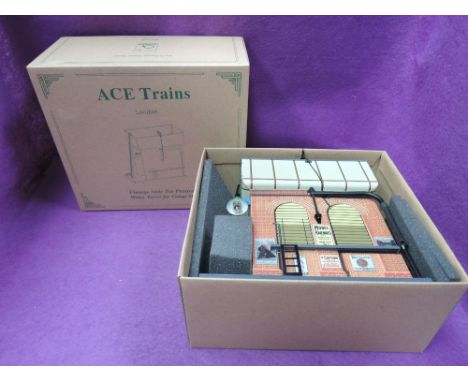An ACE Trains O Gauge Vintage Style Tin Plate Water Tower in original box with inner packaging