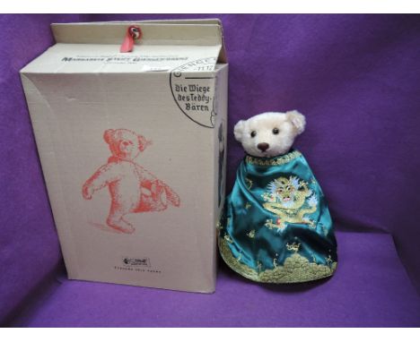 A modern Steiff limited edition Bear, Chinese Opera Teddy Bear 2003, having white tag 676031 with gold button, certificate 57