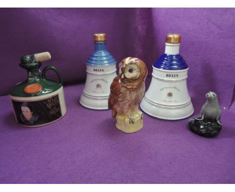 A flagon of Glenfiddich Mary Queen Of Scots malt whisky, two ceramic Bells whiskies, Whyte &amp; MacKay whisky 'Tawny Owl' wh