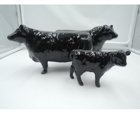 Three Beswick studies, Aberdeen Angus Family, Bull 1562, Cow 1563 &amp; Calf 1827A