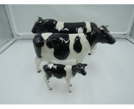 Three Beswick studies,  Friesian family, Bull 1439A, Cow 1362A &amp; Calf 1249C