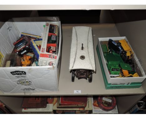 A shelf of mixed playworn diecast and pressed steel vehicles including Corgi, Tonka, Matchbox etc along with a model steam en