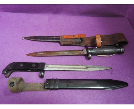 A Swedish model 1896 knife bayonet EJ. AB 11-L7 No111 with leather and metal scabbard, plus a Russian knife, bayonet for AK47