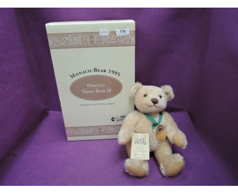 A modern Steiff Bear, Hercule Teddy Bear 28, 1995 having white tag 999079 with gold button, certificate, box, and outer box 