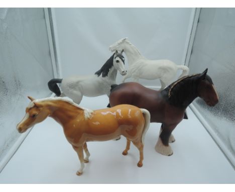 Four Beswick studies, Spirit of Fire 2829, Spirit of Wind, grey 2688, Shire Mare, brown, matt 818 and Arab Bahram, palomino 1