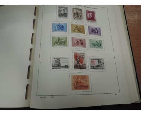 A collection of mint and used stamps of Hungary, in four Davo Magyar albums 1871-1980's