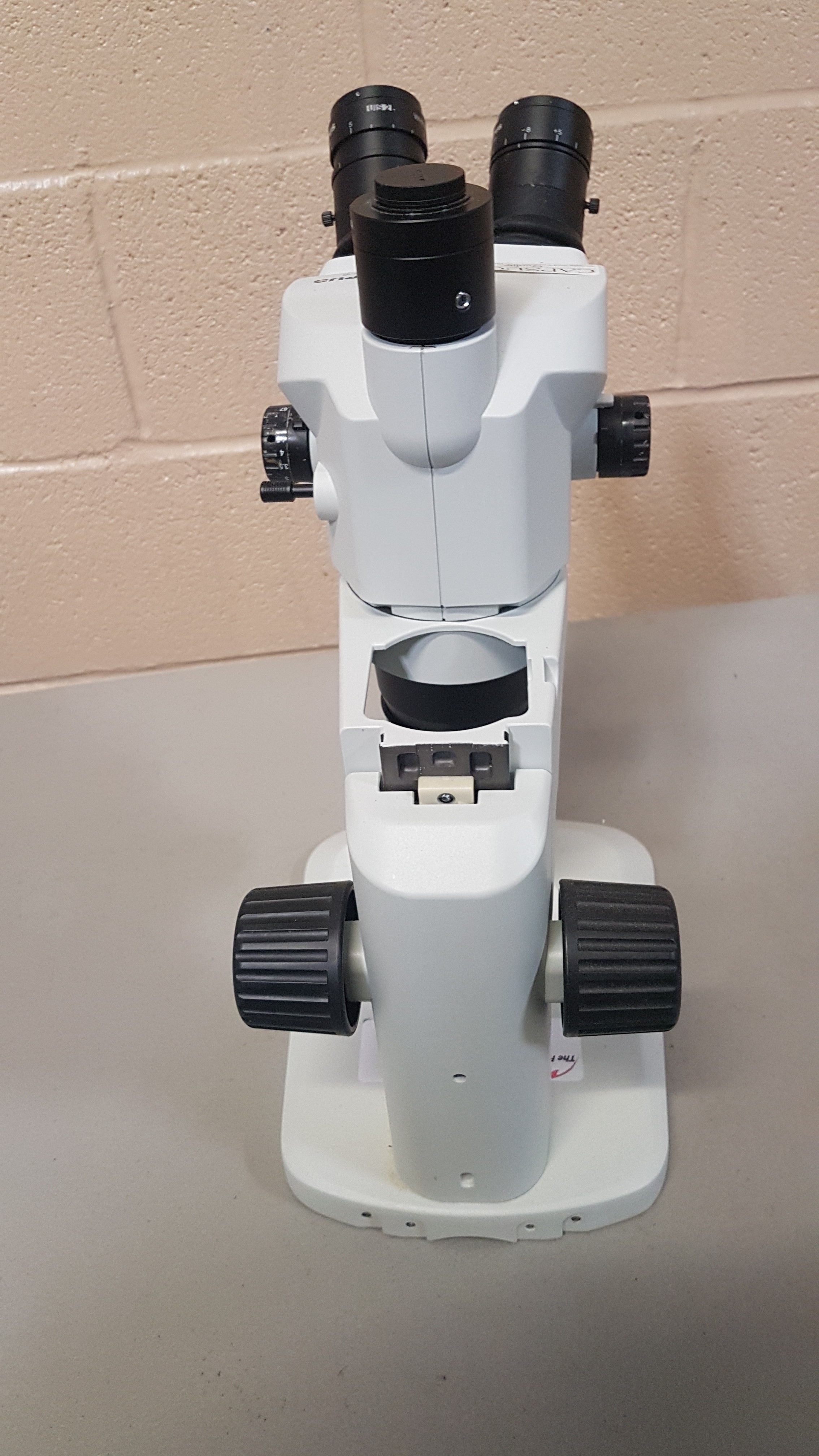 Olympus bifocal microscope, model SZ61.