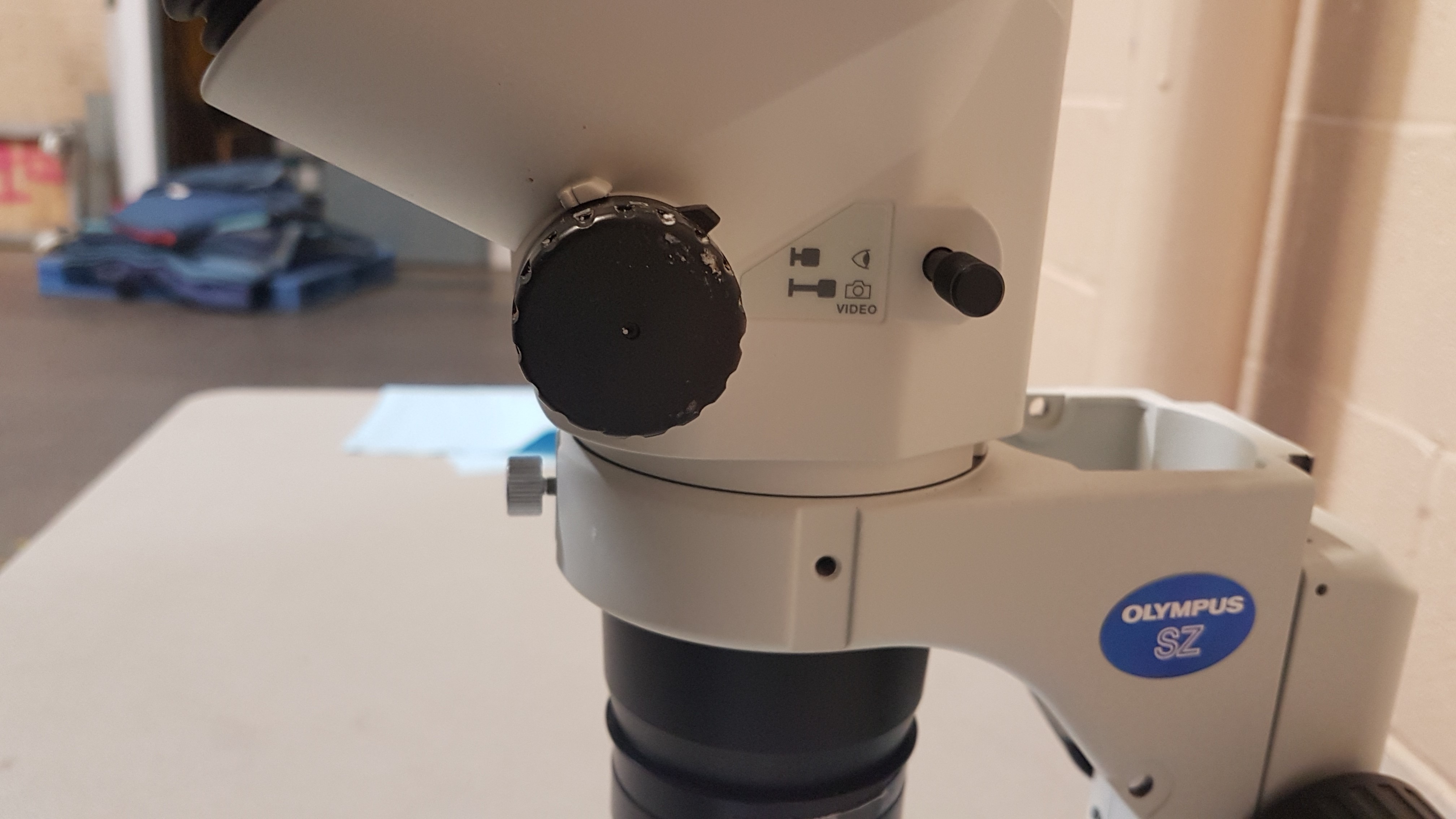 Olympus bifocal microscope, model SZ61.