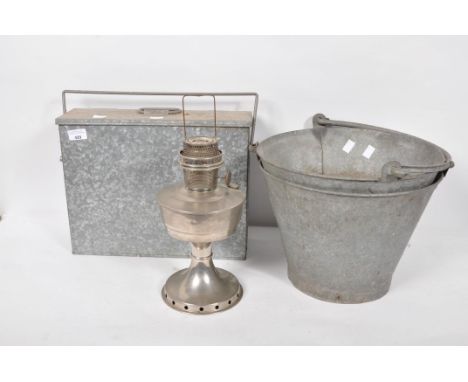 Two galvanised buckets, an ash box and a lamp