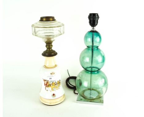 An oil lamp base and another lamp
