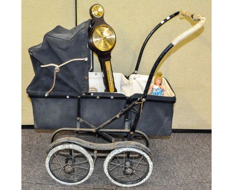 A 20th Century vintage dolls pram along with barometer