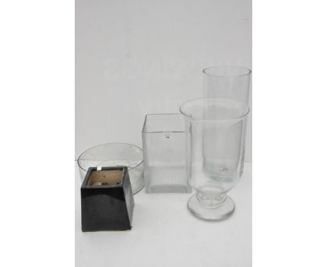 Four glass vases and a ceramic planter