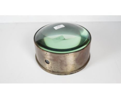 A large condenser lens from a 1920/1930's theatre limelight lamp, 12cm high x 23cm diameter