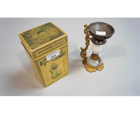 A boxed cresolene lamp