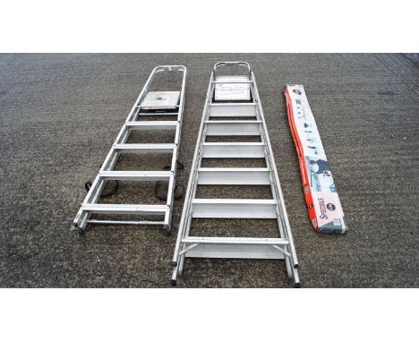 Two step ladders and storage bars