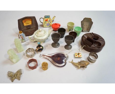 A pair of hardstone Dogs of Fo, bakelite desk calendar, miniature enamel teapot, scent bottles etc (1 box)