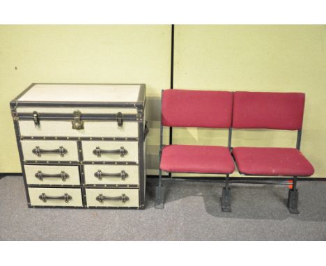 A travelling modern trunk unit and two folding cinema chairs