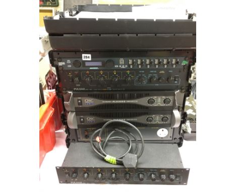QSC AUDIO PLX 3002 POWER AMPLIFIER 3002 WITH A PULSAR 04001 FOUR CHANNEL MODULATING SOUND LIGHT CHASER IN CASE WITH TWO PULSA