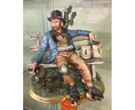 CAPO DI MONTE FIGURE OF VAGRANT ON A BENCH H 25CM APPROX