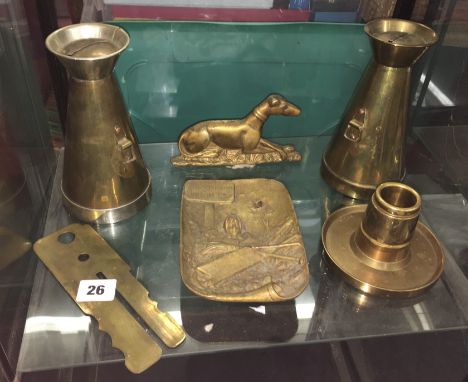 TRENCH ART FASHIONED ASH TRAY, A TUNIC BUTTON BUFFING GAUGE, A PAIR OF TAPERED BRASS MONEY BOXES AND A 'RUBBISH CAN BE SHOT H