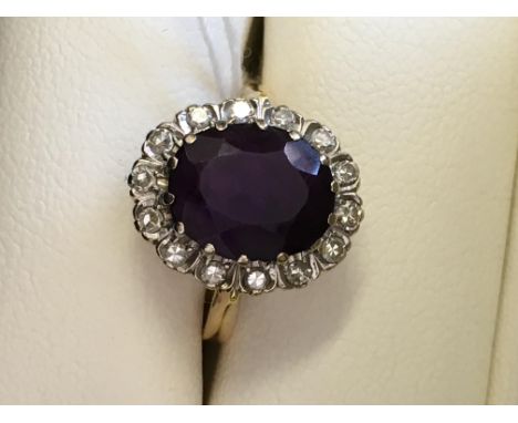 18CT YELLOW GOLD AMETHYST AND DIAMOND CLUSTER DRESS RING 4.6G APPROX SIZE M