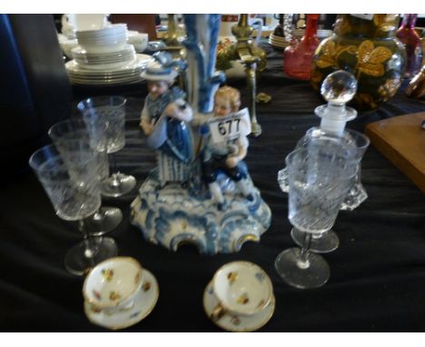 Continental ceramic boy and girl candlestick and pair of miniature ceramic cups and saucers etc.