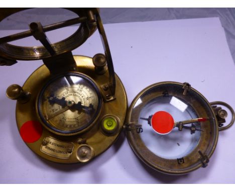 Two vintage brass compass