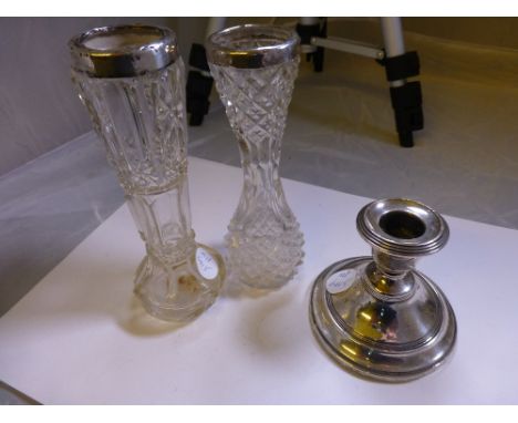 Silver candlestick and two silver topped cut glass bud vases